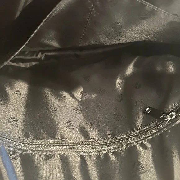 Black Leather Briefcase with Pebbled Texture and Structured Design